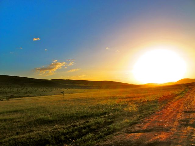 Sun Setting on Road in Africa
