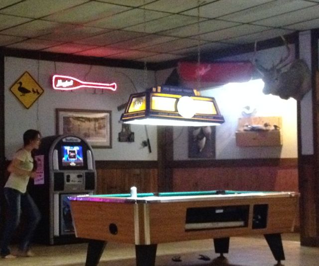 Julianne Mason rocking out to the Juke Box at The Angry Beaver Lodge