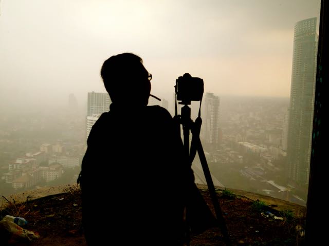 Photographer Smoking on Sathorn Unique